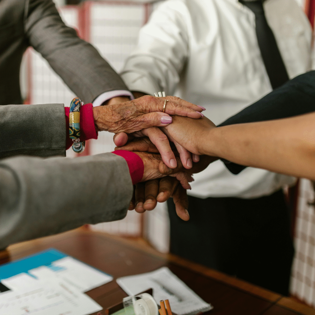 Trusted Advisory & Real Business Impact – Veritas Consulting | Partnering for Sustainable Growth Hands joined together in unity, symbolizing trusted business advisory, client partnership, and high-impact consulting solutions tailored for MSMEs and growing enterprises.